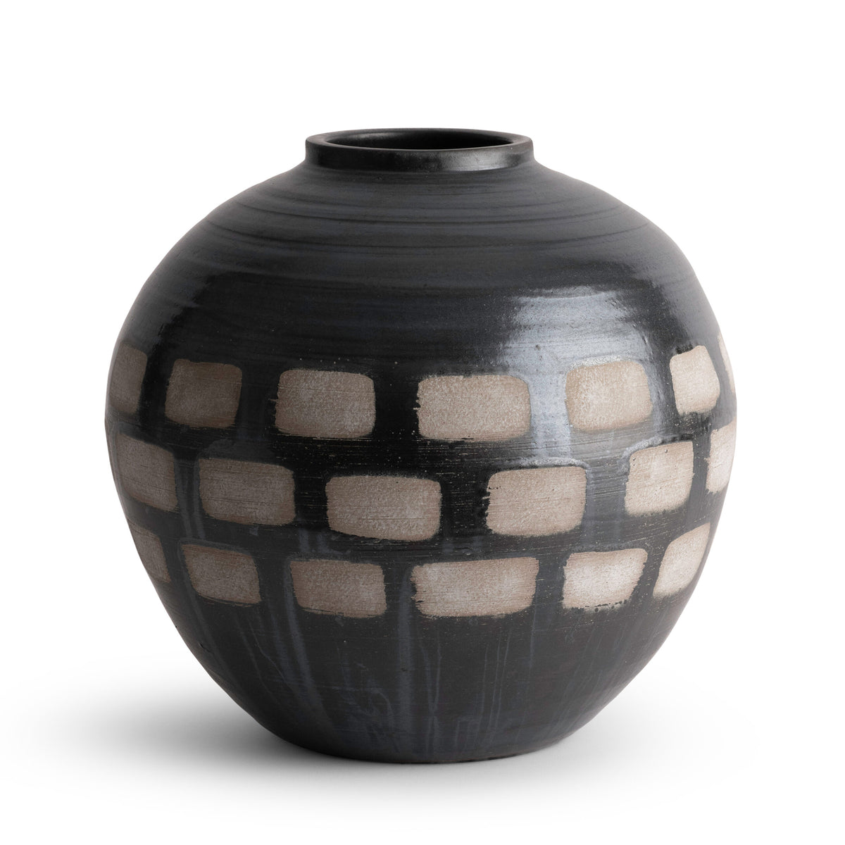 The Jude Vase by FlowDecor Inc. is a round, black brown handmade ceramic piece with a narrow opening and beige rectangular accents—ideal for bringing an organic modern touch to any space.