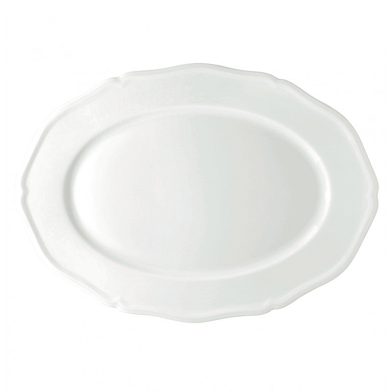 The Raynaud Argent White Dinnerware platter features a plain white, oval-shaped Limoges porcelain design with a subtle scalloped edge, shown on a white background.