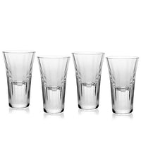 The Corinne Shot Glass Set of 4 by William Yeoward features clear, tall glasses with a slight flare and vertical grooves—ideal to pair with handmade crystal glassware for gatherings.
