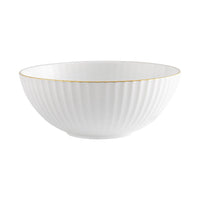 The Vista Alegre 200 Anos Dinnerware features a white porcelain bowl with vertical ridges and a hand-painted gold rim, displayed on a plain white background.