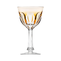 The Moser Lady Hamilton White Wine Glass features a clear crystal faceted bowl with an amber rim, smooth stem, and round base, shown against a white background.