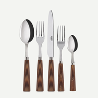 The Sabre Nature Flatware 5 Piece Setting-Light Wood features polished metal heads and light wood handles—tablespoon, dinner fork, knife, salad fork, and teaspoon—arranged vertically on a white background; dishwasher safe for easy cleaning.