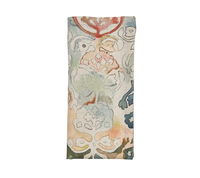 The Kim Seybert Giverny Napkin Set of 4 features folded linen napkins with an abstract floral pattern in soft blue, green, red, and beige tones—ideal for Monet-inspired decor—shown against a white background.