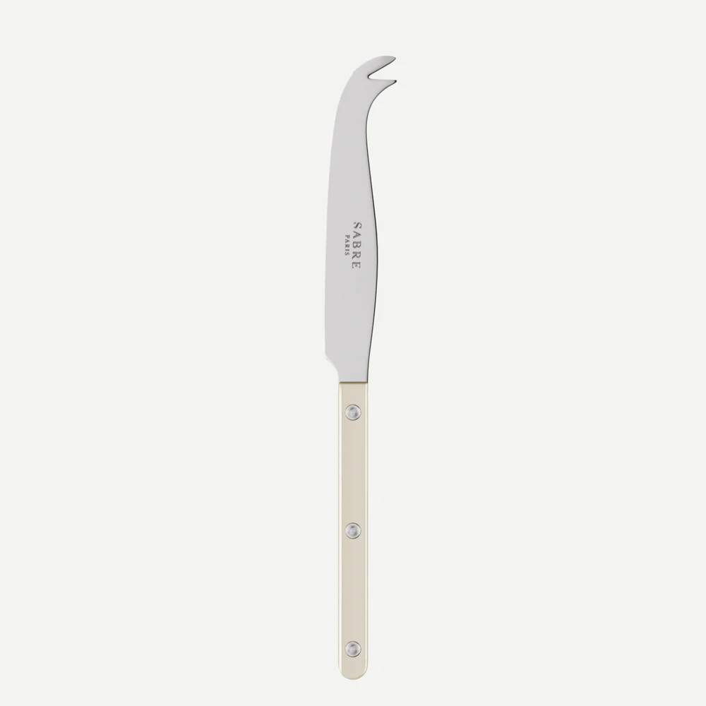 The Sabre Bistrot Pearly Cheese Knife features a stainless steel blade with a curved, forked tip and a pearly, light-colored handle adorned with three rivets. Displayed against a plain white background, it’s an ideal choice for anyone seeking customizable flatware to enhance any table setting.