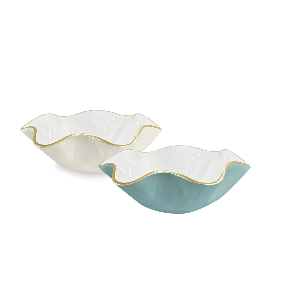The Beatriz Ball Encanto Carola Bowls (small) feature wavy edges, gold trim, and come in cream and teal.
