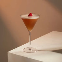 The Richard Brendon Cocktail Collection Classic Martini Glass Set of 2 showcases your favorite cocktail in style, featuring elegant crystal glasses—ideal for any occasion.