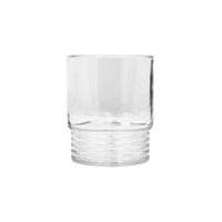 A clear, cylindrical Santorini Acrylic Drinkware tumbler by Le Cadeaux with a ribbed base sits on a white background, highlighting the elegance of BPA-free drinkware.