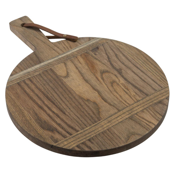 The JK Adams Ash Driftwood Round Serving Board, featuring a handle and leather loop with visible wood grain, adds rustic charm to any table. The round ash wood design stands out beautifully against a clean white background.