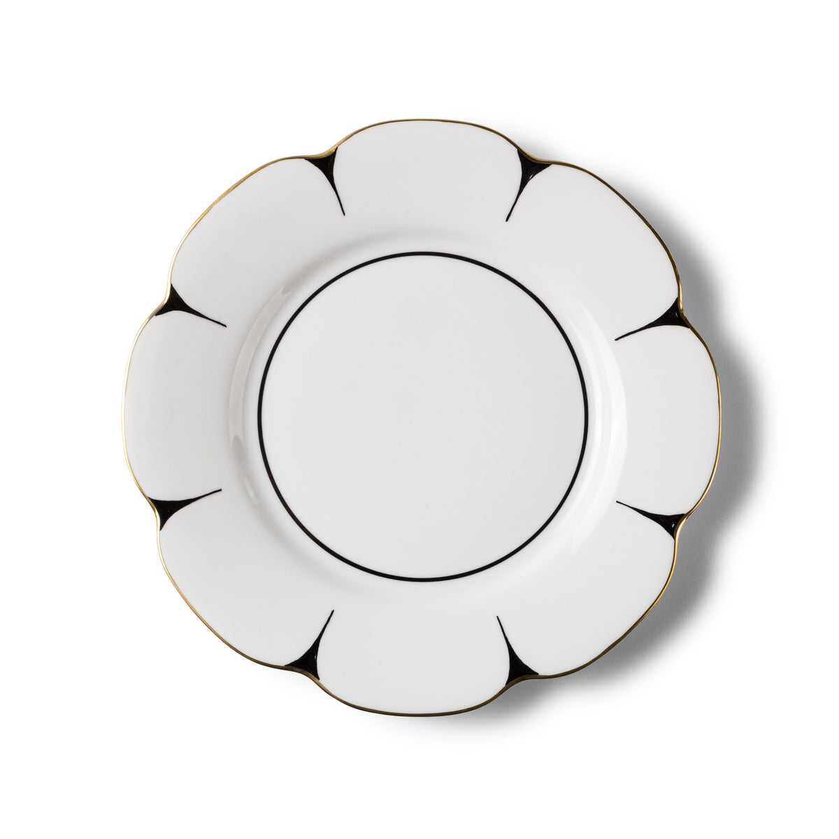 The Drops Dinnerware plate by Molecot is a white Limoges porcelain piece with a scalloped, flower-shaped edge, featuring thin black lines and gold-trimmed rim, shown on a white background.