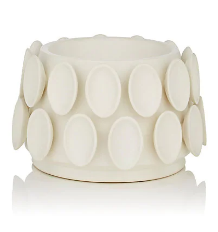 The KleinReid Cumulus Collection Alabaster bracelet features a white, cylindrical form with two rows of evenly spaced, raised ovals reminiscent of handcrafted vase textures, shown against a plain white background.