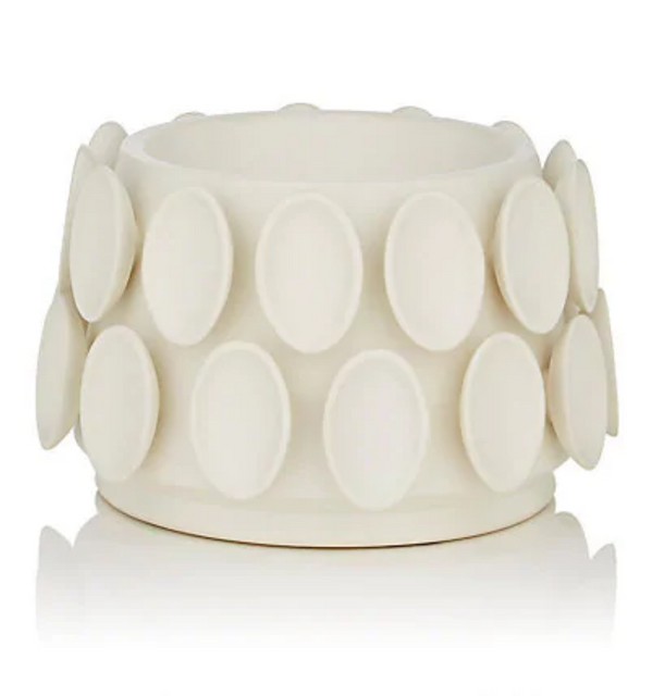 The KleinReid Cumulus Collection Alabaster bracelet features a white, cylindrical form with two rows of evenly spaced, raised ovals reminiscent of handcrafted vase textures, shown against a plain white background.