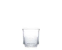 The Cadence Barware by Saint-Louis/Hermes is a clear crystal tumbler, handcrafted with a ribbed texture on the lower half, displayed against a plain white background.