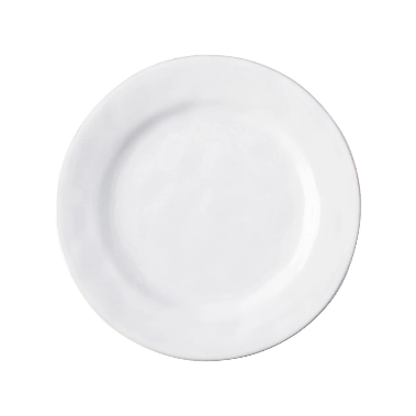 The Juliska Puro Dinnerware White plate, featuring a simple round design, is showcased against a white background.