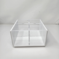 The Eye Candy College Spinner is a clear acrylic box with four equal compartments, perfect for organizing your college desk. Shown here against a plain white background.
