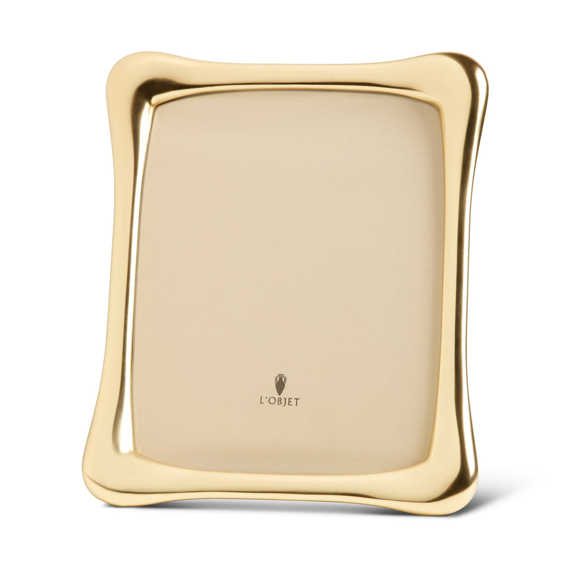 The Anton Frame Gold by L'Objet features softly curved edges and a reflective gold finish, with a blank interior except for the L’Objet logo, making it perfect for displaying your cherished memories.