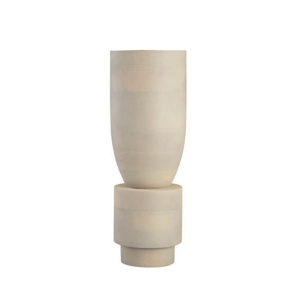 The Bastone Vase by Elk Group features a minimalist, modern design in cream with a tall cylindrical top and wide base, perfect for contemporary spaces. Shown against a white background.