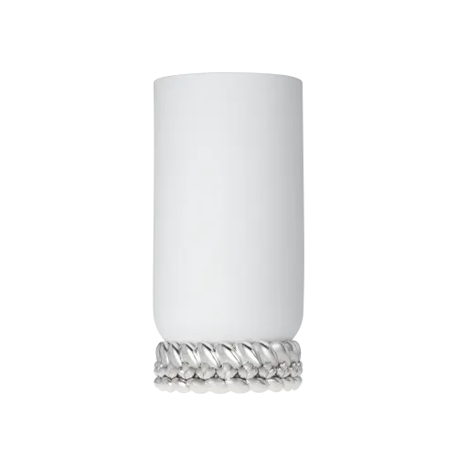 The Babylone Vase by Christofle is a tall, handmade white porcelain piece featuring a decorative silver braided pattern at its base, made in France and displayed on a plain light gray background.