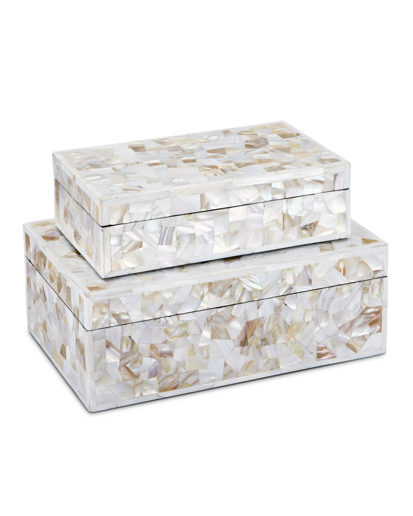 Two rectangular Simplicity Mother of Pearl Boxes by Currey & Company, each topped with a sleek lid and adorned in a lustrous mother-of-pearl mosaic of white and cream. The large boxes are stacked gracefully, showcasing a stunning display of beige and iridescent tones.