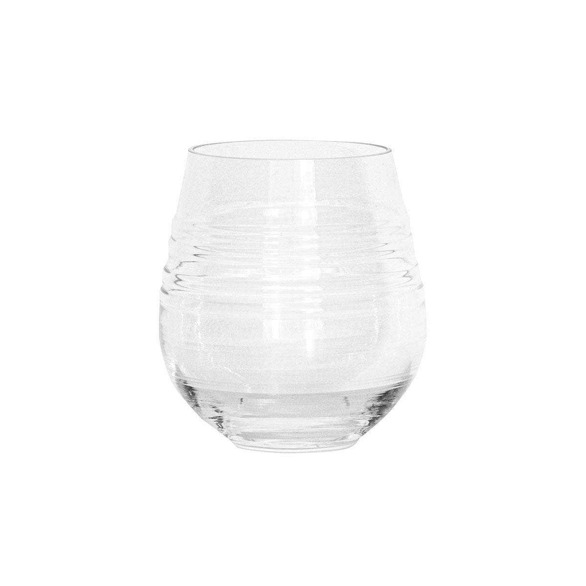 A clear, empty Puro Glassware tumbler by Juliska features a rounded shape with horizontal ridges around the middle. Set against a plain white background. Dishwasher safe for easy cleaning.