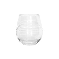 A clear, empty Puro Glassware tumbler by Juliska features a rounded shape with horizontal ridges around the middle. Set against a plain white background. Dishwasher safe for easy cleaning.