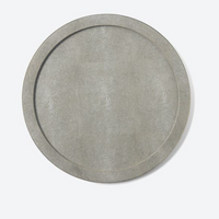 The Langston Round Tray - Sand / Gold by Blue Pheasant is a sand-toned serving tray with a subtle faux shagreen texture and gently raised rim, shown against a plain white background.