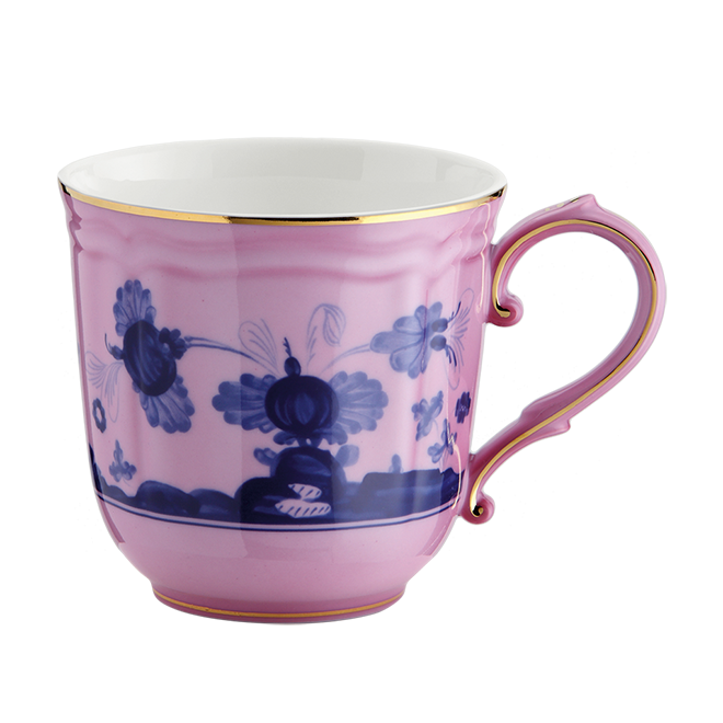 The Oriente Italiano Dinnerware Azalea teacup by Ginori 1735 features a pink and white base, dark blue chinoiserie floral motif, gold rim, and ornate handle with gold accents. Shown on a plain white background.