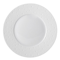 The Bernardaud Ecume White Dinnerware plate features a textured, dotted pattern on its rim and is shown from above against a white background.