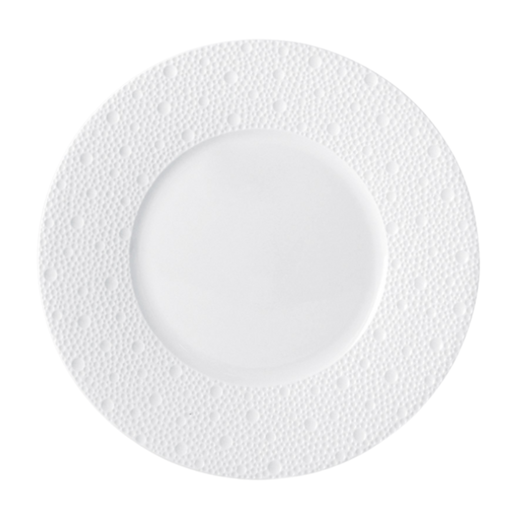 The Ecume White Dinnerware by Bernardaud is a white, round Limoges porcelain plate featuring a textured dotted rim, shown from above on a plain background.