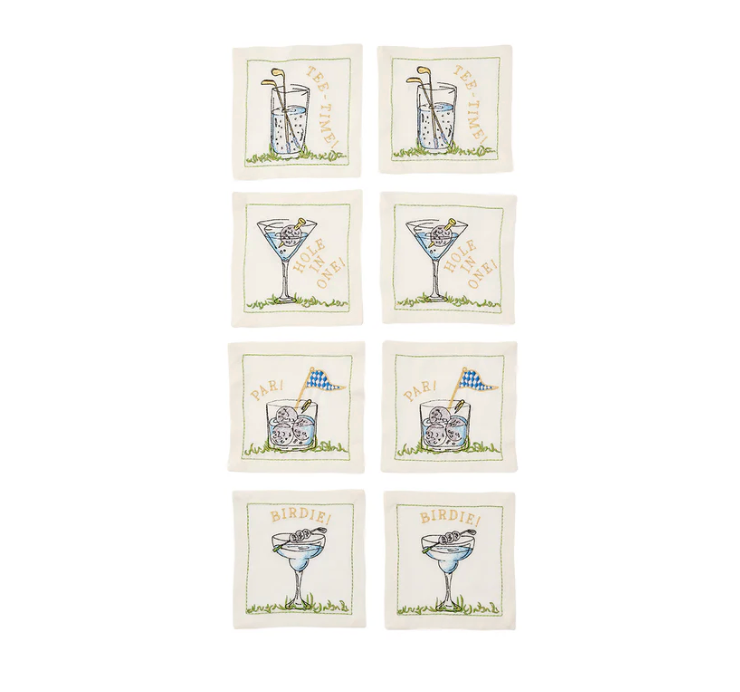 Set of eight Kim Seybert “Cocktail Napkin s/8 - Tee Time,” featuring embroidered, hand-drawn golf-themed illustrations and playful phrases such as TEE TIME, HOLE IN ONE!, PAR!, and BIRDIE! on crisp white linen. Perfect as golf cocktail napkins or a thoughtful hostess gift for any golf enthusiast.