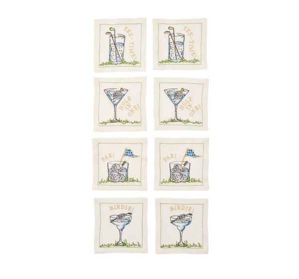 Set of eight Kim Seybert “Cocktail Napkin s/8 - Tee Time,” featuring embroidered, hand-drawn golf-themed illustrations and playful phrases such as TEE TIME, HOLE IN ONE!, PAR!, and BIRDIE! on crisp white linen. Perfect as golf cocktail napkins or a thoughtful hostess gift for any golf enthusiast.