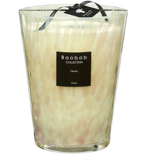 A large, translucent white Baobab Candle Pearls White in a textured glass container features a black label and ribbon, inspired by the elegance of white pearls.