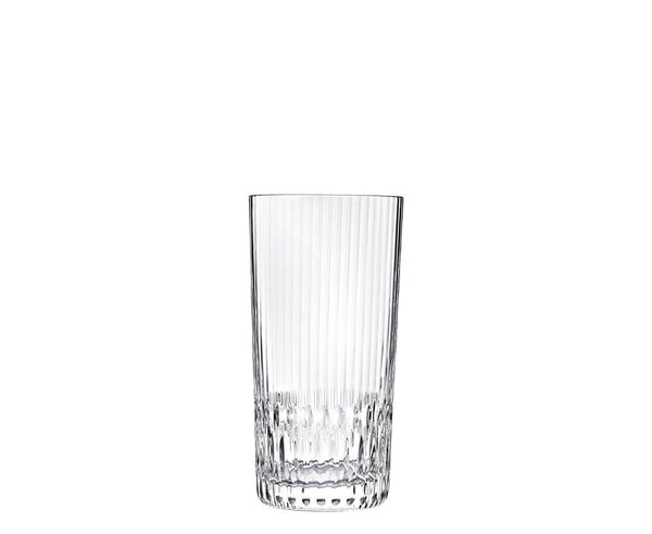 A clear, tall Apollo Barware glass by Saint-Louis/Hermes features vertical Venetian stripes and a textured base, shown against a plain white background.