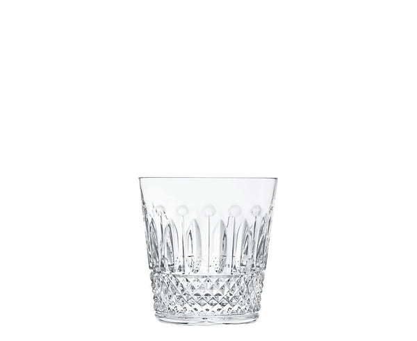 The Saint-Louis Tommy Barware crystal glass tumbler features exquisite diamond-cut facets and a textured design near the base, beautifully showcasing skilled glasscraft artistry against a plain white background.