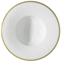 The Mineral Irise Gold Filet Dinnerware by Raynaud is a modern round white plate with a subtle textured pattern, thin gold rim, and gentle central indentation creating a shallow bowl effect.