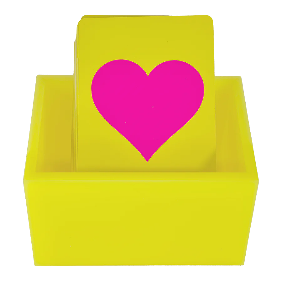 The Canasta Sets Canasta 2 Deck Holder features a stack of yellow cards topped with a pink heart in a matching yellow box, offering a charming way to hold cards for Canasta games.