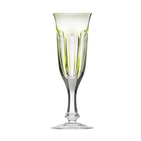 The Moser Lady Hamilton Champagne Glass 140ml is a clear hand-cut crystal flute with a subtle green rim, vertical cut patterns, and a slender stem on a round base, echoing classic Lady Hamilton drinkware style.