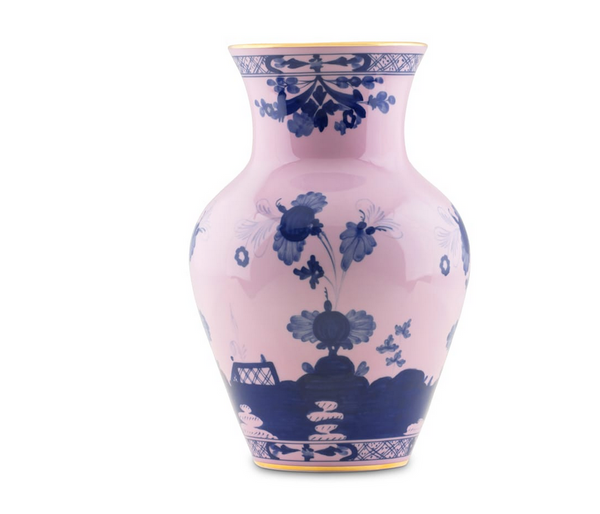 The Oriente Italiano Ming Vase 9" by Ginori 1735 features pink ceramic with blue floral and geometric designs plus gold-edged rims, adding Italian elegance. Displayed on a white background.