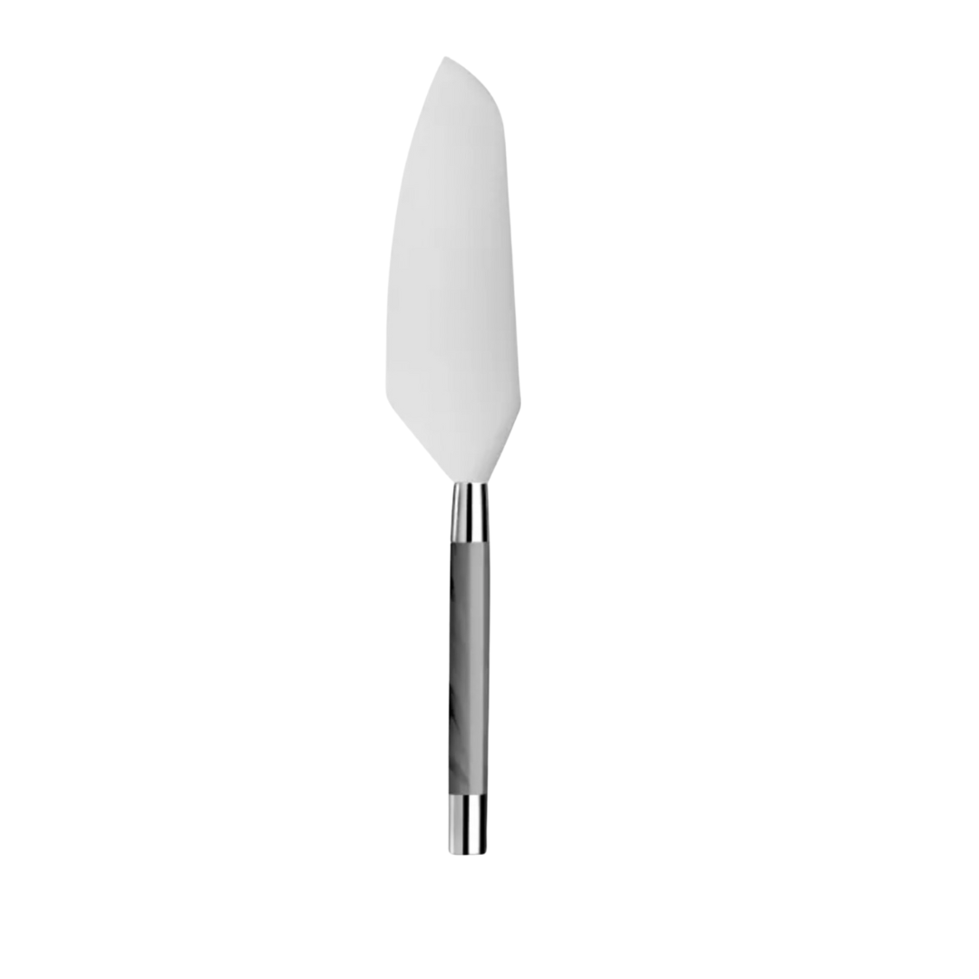 The Capdeco Conty Cutting Cake Server features a wide, flat, triangular 18/10 stainless steel blade and a sleek metallic handle, shown on a plain white background.