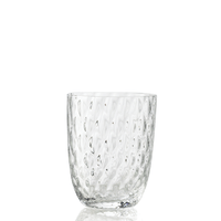 The Idra Tumbler Optic by Nason Moretti is a clear glass tumbler with a textured, dimpled surface, shown standing upright on a white background.