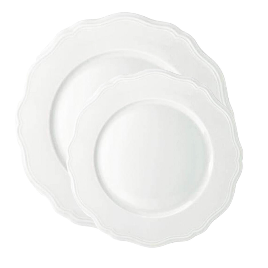 Two Argent White Dinnerware plates by Raynaud—one small, one large—with elegant scalloped edges overlap on a white background, highlighting the refined porcelain tableware.