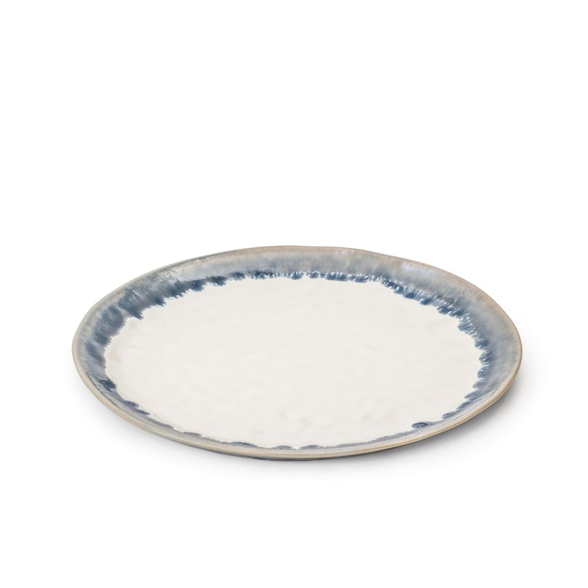 A round ceramic plate from the Simon Pearce Burlington Dinnerware Pool collection, featuring a white center and blue glazed, watercolor-style edge, is displayed against a plain white background.