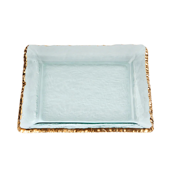 The Annieglass Edgey Square Platter Gold 12" is a handmade glass platter with textured, raised edges, a 24kt gold border, and a clear yet slightly frosted look for an elegant touch.
