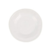 The Aria Dinnerware by Vietri is a handcrafted, round white stoneware plate with an organic, slightly uneven edge, shown from above on a white background.