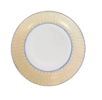 A round, white Marie Daâge Ruban 1 Dinnerware porcelain plate by Marie Daâge features a beige and light blue patterned rim, shown from above on a white background.