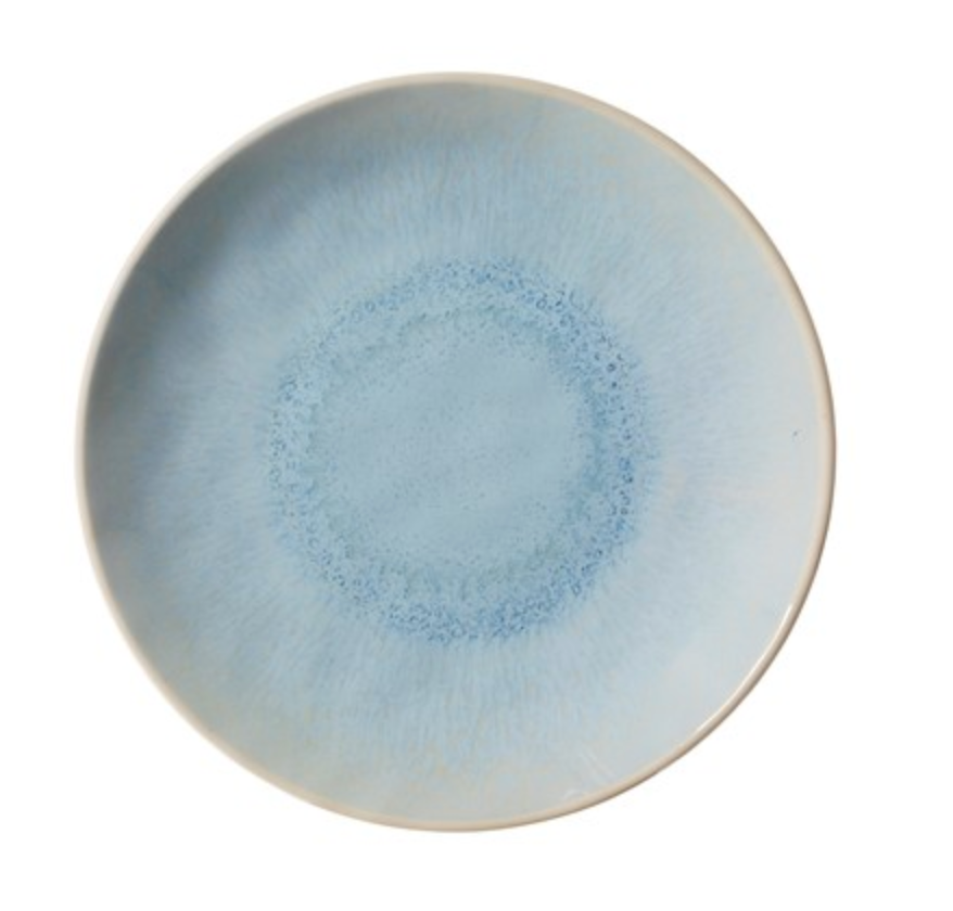 The Merritt Reactive Glaze Melamine Dinnerware Blue plate features a round shape with a light blue center, speckled darker blue ring, and pale blue-gray edge, offering a smooth texture and artisanal stoneware-inspired gradient.