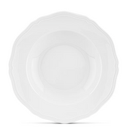 The Antico Doccia Dinnerware by Ginori 1735 is a pure white porcelain plate featuring a scalloped, wavy edge and delicate embossed detailing inspired by Florentine silverwork, photographed from above against a white background to showcase its timeless design elegance.