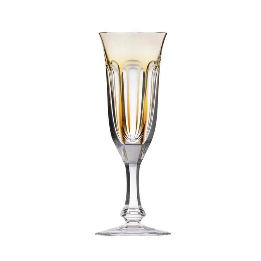 The Lady Hamilton Champagne Glass 140ml by Moser features elegant vertical facets, a flared rim with a subtle gold tint, and a slender stem—hand-cut crystal inspired by Lady Hamilton drinkware, shown against a white background.