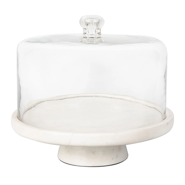 The Godinger Marble Footed Cake Stand with Dome features a round white marble base and pedestal, topped with a clear glass lid with knob handle. Ideal for elegant dessert displays, the stand is shown empty.