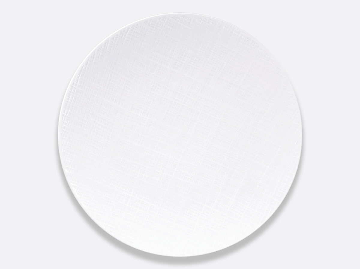 Bernardaud's Organza White Dinnerware, crafted from Limoges porcelain and featuring a subtle crisscross texture, is shown on a light gray background—an ideal accent for minimalist interiors.
