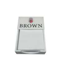 The Eye Candy College Note Pad features a white holder with blank note paper and a lid showing the Brown University crest above "BROWN" in bold black letters—ideal as a graduation gift or custom school note pad.